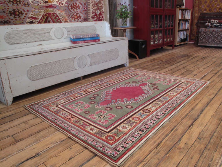 Antique Kirsehir rug. A lovely antique Central Anatolian rug, from a region well-known with its prayer rugs, featuring a more unusual design. Good range of colors. Rug is a nice collectible piece and good state of preservation.