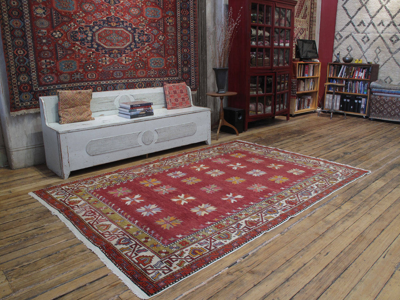 Yuntdag rug. A beautiful old tribal rug from Western Turkey, a type that has become increasingly hard-to-find. Large stylized flowers in the field are surrounded by a border of scrolling vine. Rugs like this are the last link of a centuries-old