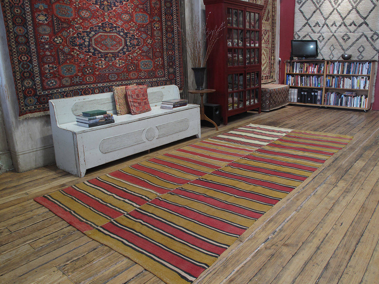 Banded Kilim runner rug in two panels. An old tribal flat-weave from Central Turkey, rug is woven in two narrow panels with alternating bands of color. Wonderful patina. The panels can easily be separated and used as two narrow rug runners.