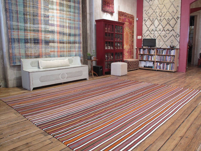 Large and colorful striped Jajim rug. A wonderful and unusually large tribal flat-weave rug from Southeastern Turkey, woven in the 