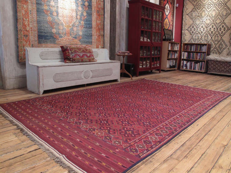 A large tribal floor cover by the Yomut Turkmens of Central Asia, woven in an intricate brocading technique. A very high quality example with great colors and nice details.