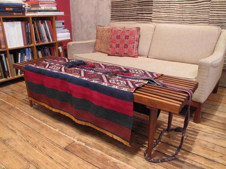 Antique grain sack 'open' rug. An old tribal cargo bag or rug from SW Turkey, opened up, still retaining its original carrying band. Can be a wall-hanging, a table cover or made into a large cushion. A beautiful, authentic example of tribal art - a