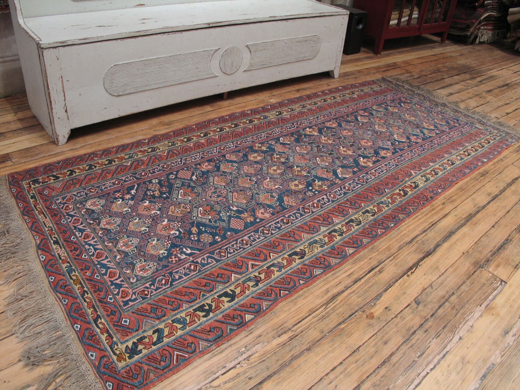 Antique Sumak runner rug. Beautiful antique sumak flatweave runner rug from the Caucasus. Great design and color palette, elegant proportions. Rug is in excellent condition.