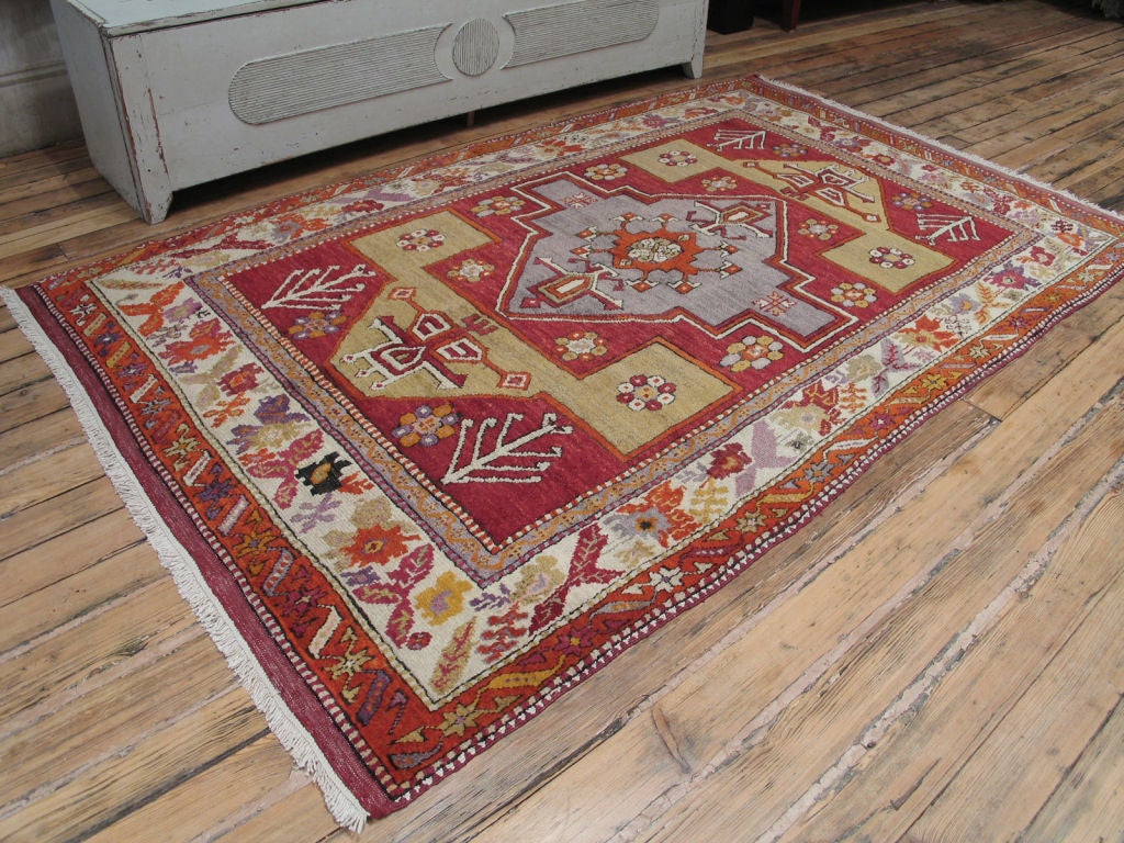 Yuntdag rug. A very charming vintage Turkish rug with surprising color palette.