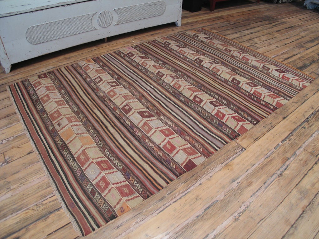 Vintage Kurdish kilim with great colors and excellent quality weave.