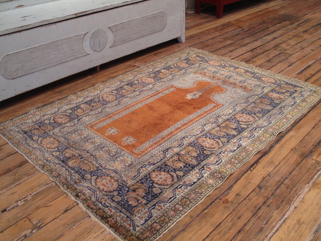 A handsome Turkish prayer rug featuring a Classic design that has been popular for centuries.