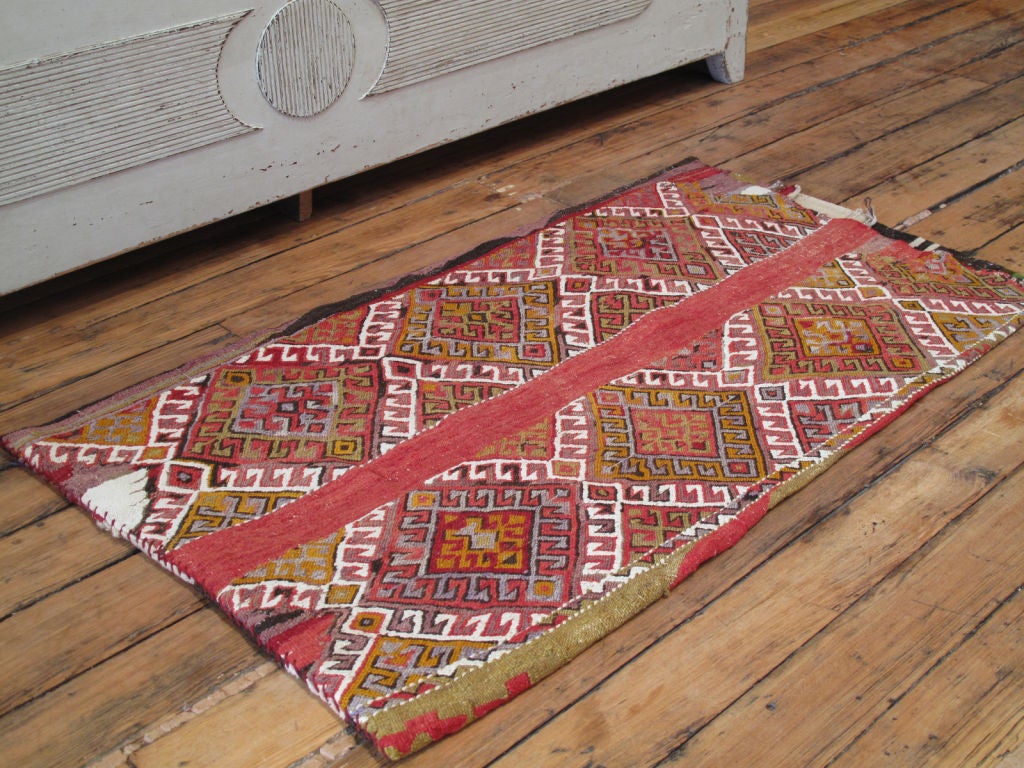 A tribal cargo bag from SE Anatolian nomads. These bags feature symbolic designs unchanged for generations. They can be used as floor rugs, wall hanging or can be stuffed to make cushions. (We always have a number of these in stock - see last