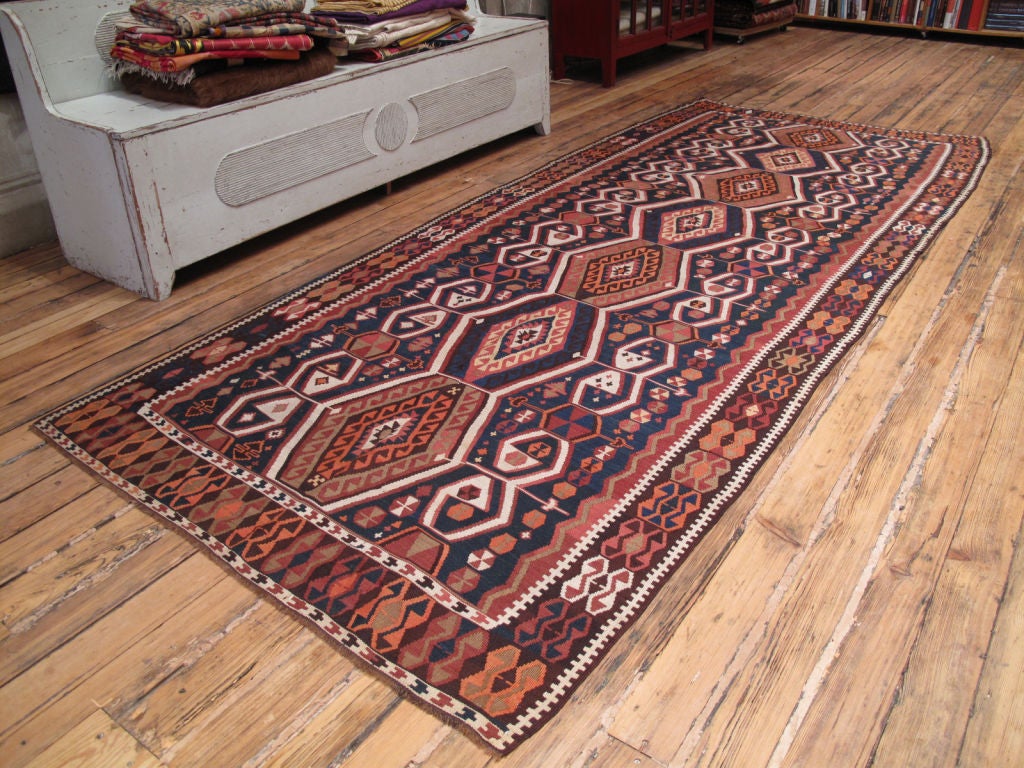 Antique Kagizman Kilim rug. Beautiful Kurdish kilim rug from Eastern Turkey, with a warm color palette, enhanced by the use of natural brown wool.