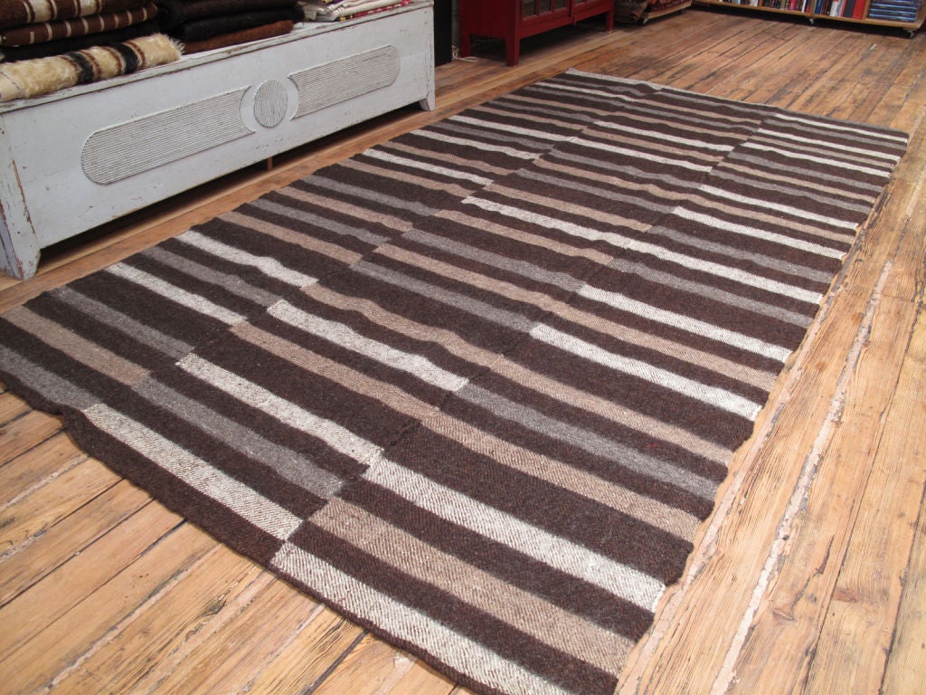 Pomak Kilim rug or blanket. This is a very hefty weaving that feels almost like a felt rug. It is referred to as a blanket but is more suitable as a floor cover. Beautiful shades of un-dyed wool.