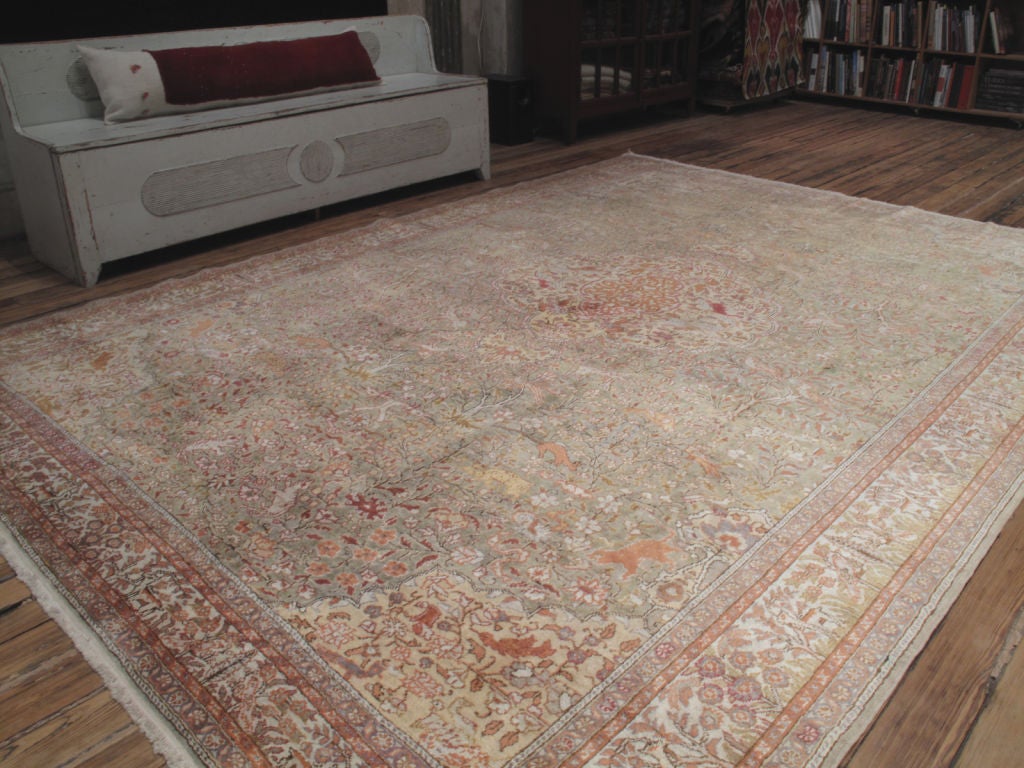 Elegant old Turkish carpet, woven with mercerized cotton - cotton processed to imitate silk - with great patina, sheen and soft color palette. Hard to find size.