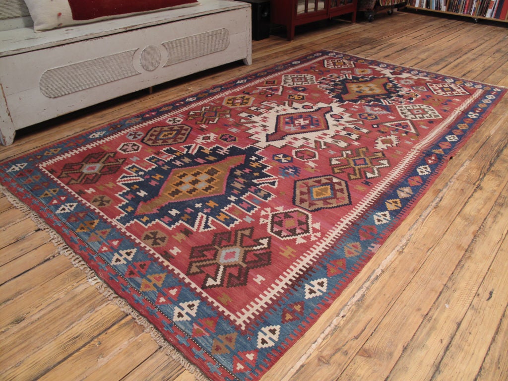 Kuba Kilim rug. An old tribal Kilim rug from the Caucasus with somewhat unusual design.