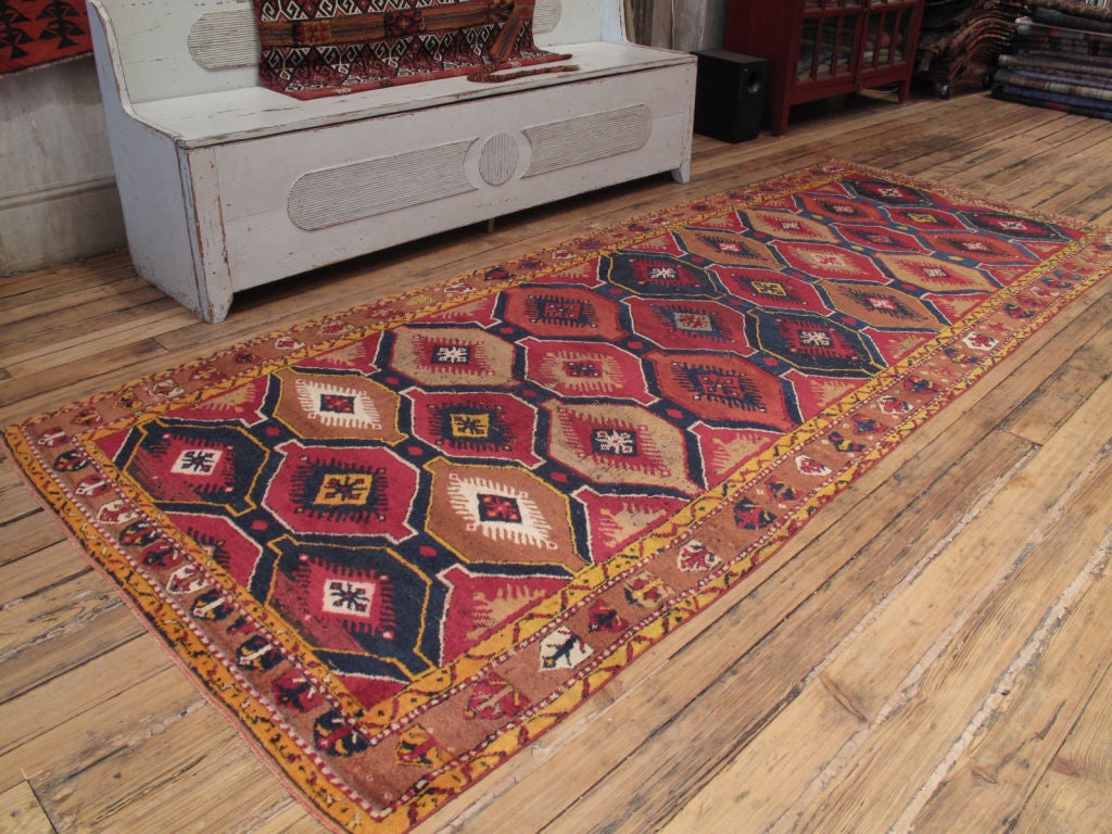 Konya wide runner rug. A great old village runner rug from Central Turkey. Rug shows its age but still sturdy and very charismatic.