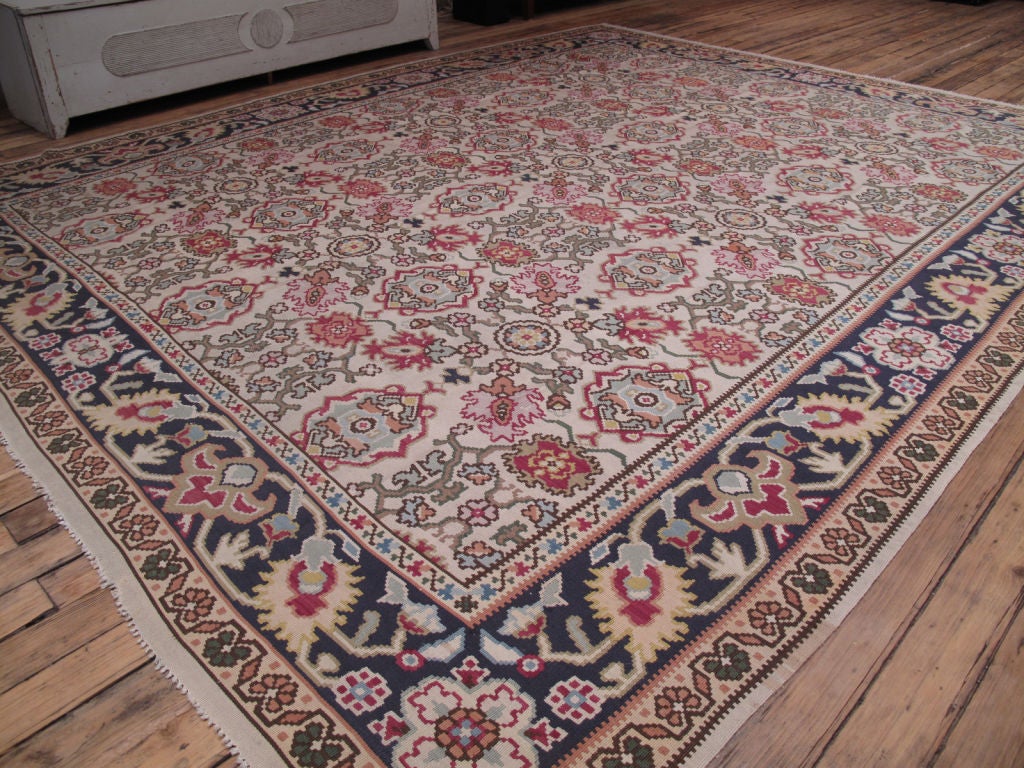Large Bulgarian Kilim rug. Large SE European Kilim rug with ivory background and pleasant color palette.