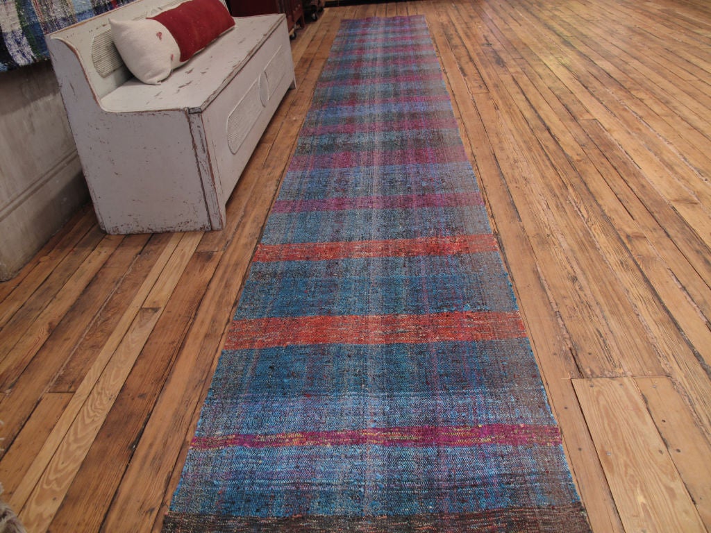 Vintage Turkish kilim woven using re-cycled cotton fabric, wool and goat hair. This is a technique used by weavers all around the world. We recently acquired a number of these and they are more sturdily made, with great colors than any others that