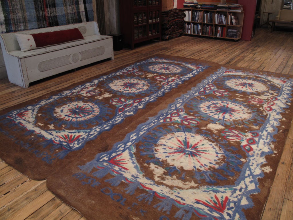 Large felt carpet or rug. A large old wool carpet or rug from Central Turkey, made of two identical halves stitched together, in 