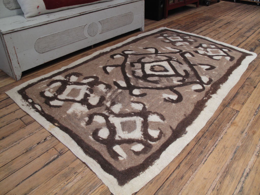 Tribal rug made in felt technique, matting, condensing and pressing wool fibers, possibly the oldest form of fabric. Felt rugs were the everyday floor covers in nomads' tents and village homes in Turkey and Central Asia.