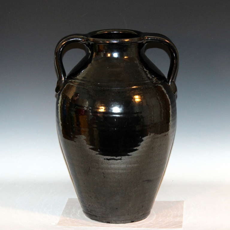 Large North Carolina vase in great metallic black glaze, circa early 20th century. With big, applied strap handles. Great,  dark, oily, crystalline black color. 16 1/2