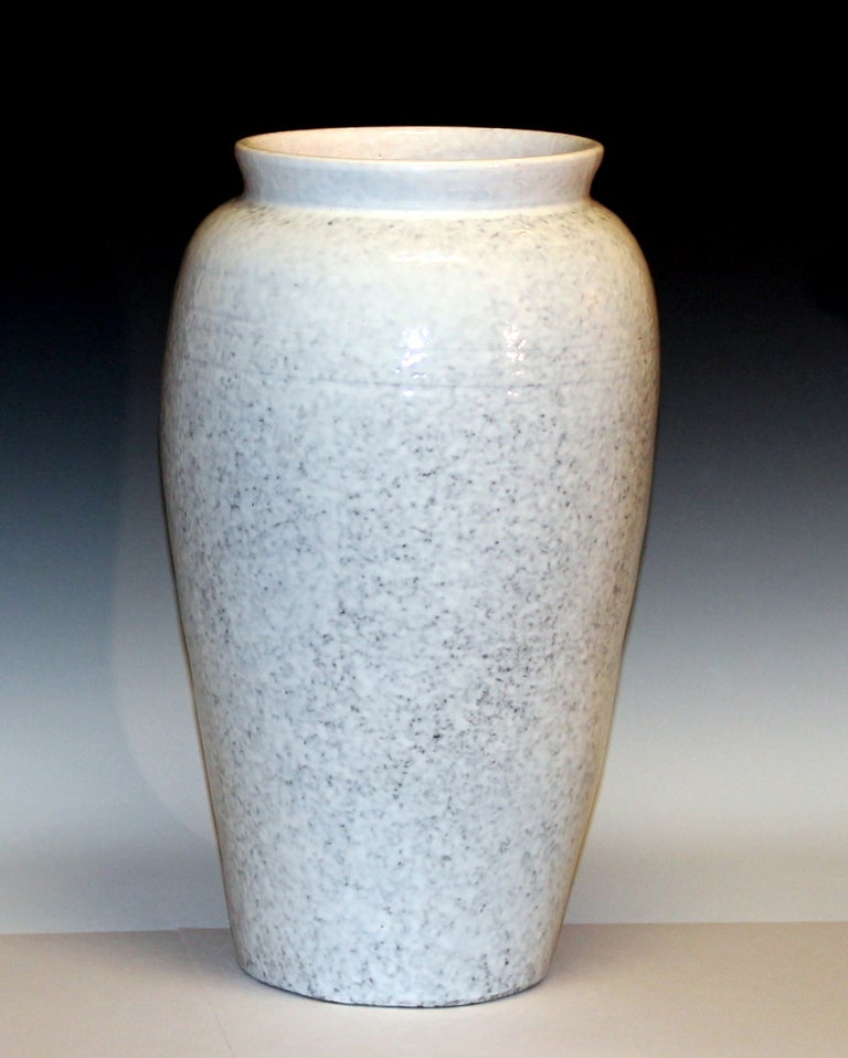 Large Bitossi vase with the form based on a classical oil jar and covered in a bright, mottled white glaze.