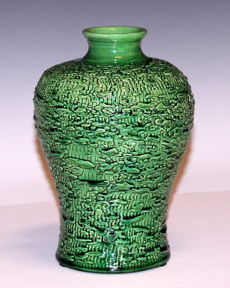 Awaji pottery vase in pleasantly proportioned meiping form with richly textured surface. Circa 1920's. 7 3/4