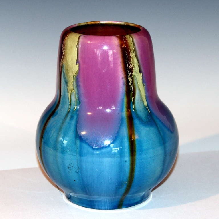 Vintage Awaji vase in organic form with pink, caramel, and khaki drip glaze over turquoise, circa 1930. Impressed export and kiln marks. Measures: 7