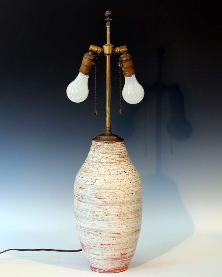 Vintage studio pottery lamp with defined ribs and frothy, crackled glaze. Circa 1950's. 28