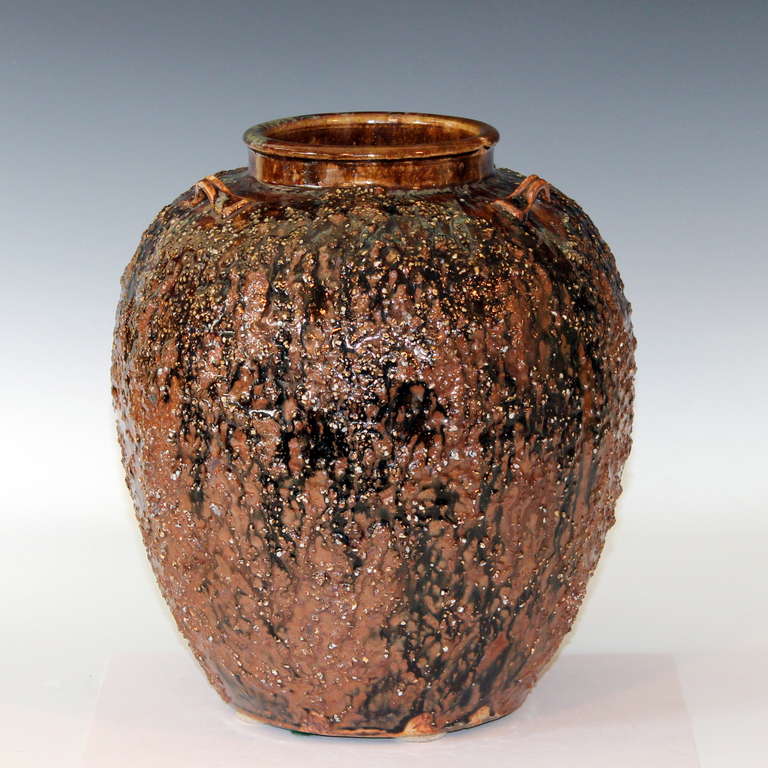 Japanese storage jar from the Shigaraki Valley with three lug handles and volcanic black and brown glaze. Early/mid 20th century. 11