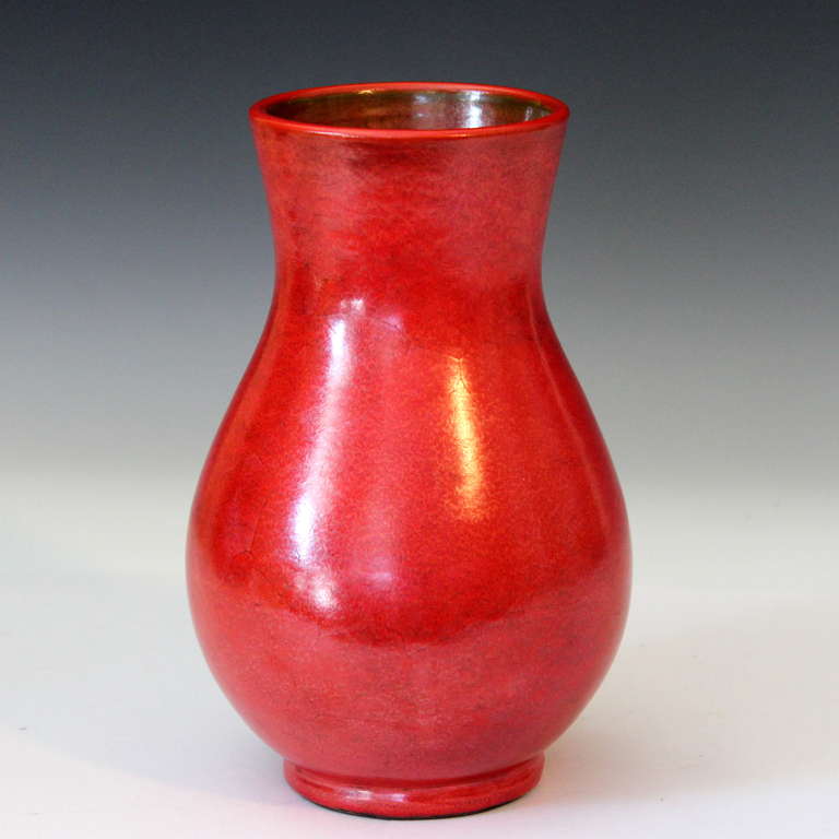 Vintage hand thrown Italian art pottery vase for the high end San Francisco retailer Joseph Magnin, circa 1950's. In fierce microcrystalline chrome red glaze. 8 1/4