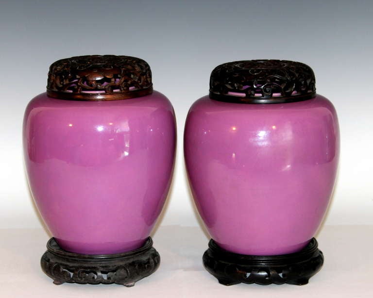 Vintage pair of Awaji ginger jars with wooden stands and covers in great, Art Deco, lavender glaze. Impressed marks. 9 1/2 inches high, 7 inches diameter. Excellent condition.