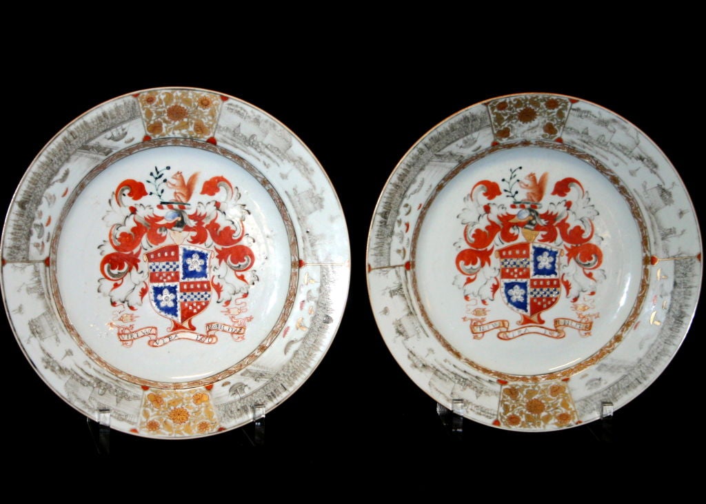 Large pair of very rare chargers from the Lee of Coton service, considered the finest armorial service ever ordered by an English family.  The border showing early scenes of London viewed from the south bank of the Thames with London Bridge at the