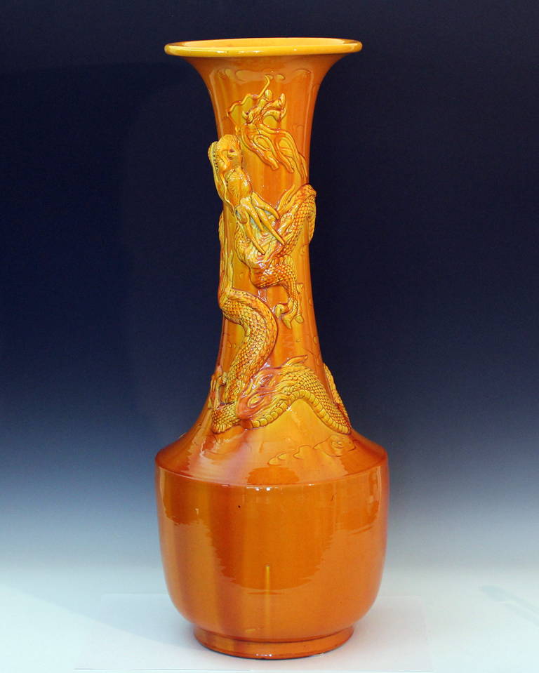 Large Awaji vase with dragon encircling the long neck in amber yellow glaze, circa 1920's. 29