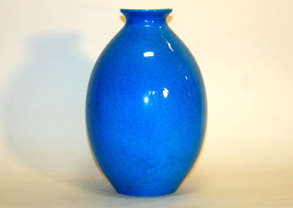Belgian art pottery vase by Boch Freres in brilliant turquoise crackle glaze.