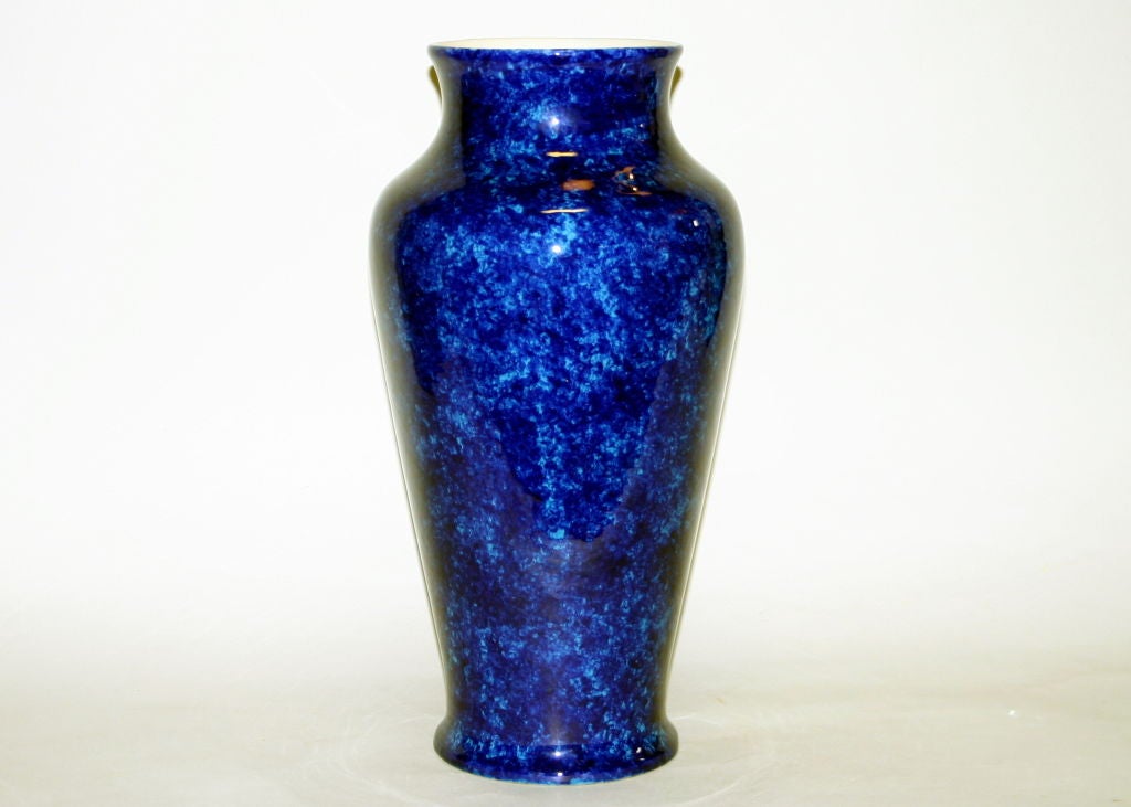 Large art pottery vase in baluster form with deep cobalt blue mottled over a turquoise ground. Manufactured by the Paul Milet Pottery in Sevres, France.