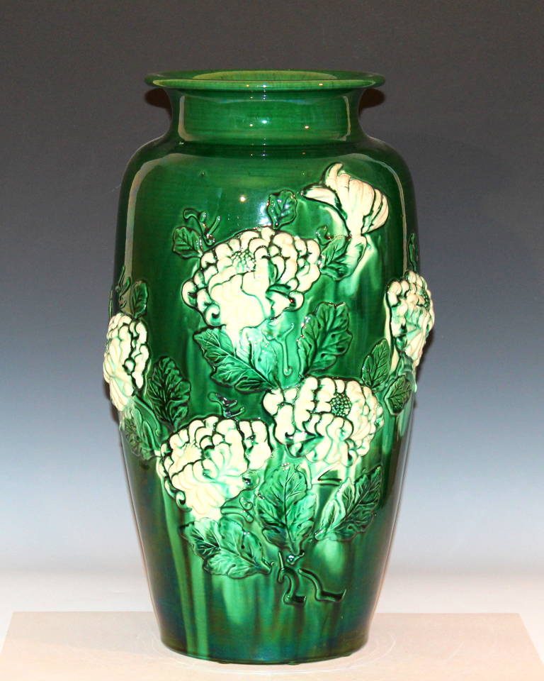 Large Awaji Pottery vase with applied chrysanthemums and green and white glazes, circa 1930. Measures: 18 1/4