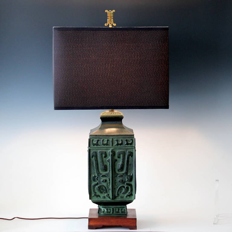 Large vintage lamp, in archaic Chinese style, attributed to James Mont, circa 1960's. Quality manufacture with great detail and finished to look like ancient bronze. 32