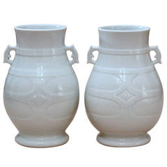 Matched Pair Japanese Studio Carved Porcelain Blanc de Chine Vases
