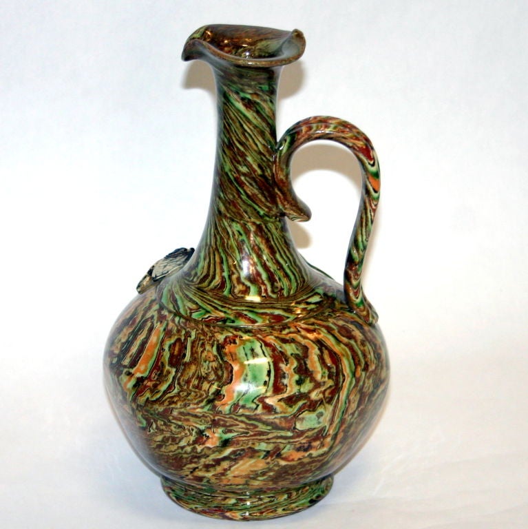 Antique French jug from the small Pichon pottery in the village of Uzes in Provence. Made from marbleized clay with delightful cicada chewing on an olive branch.