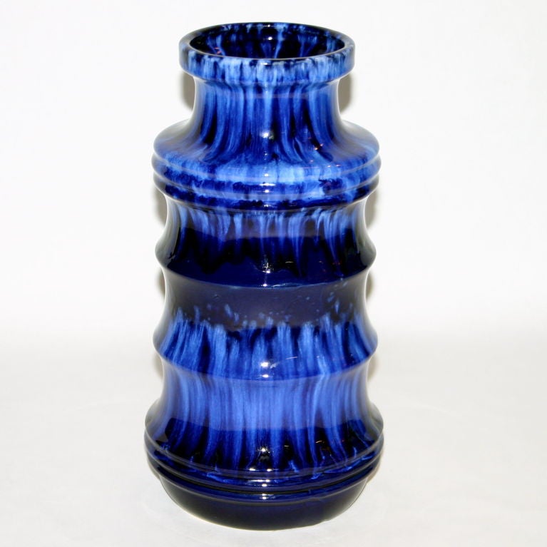 Undulating West German art pottery vase with great blue flambe glaze.
