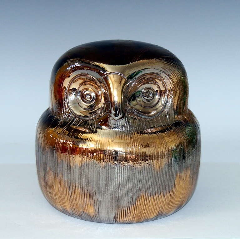 Vintage Bitossi pottery owl glazed to striking effect in platinum and gold luster. Circa 1960's.  6 1/2