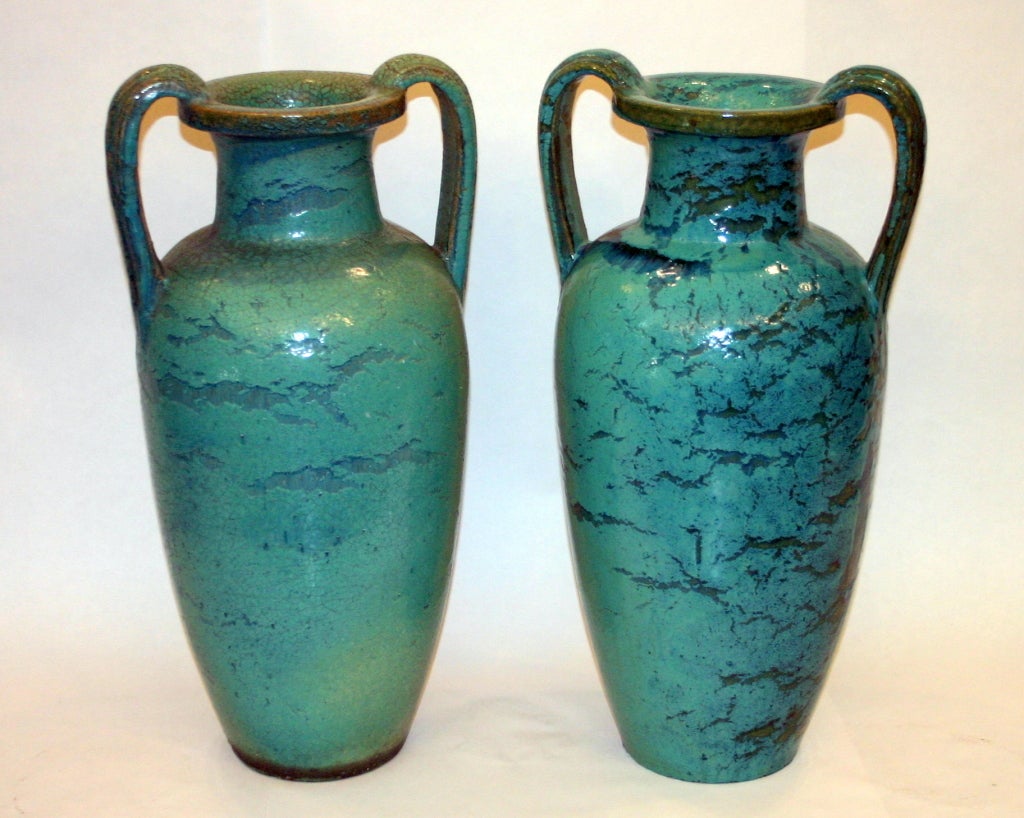 Large pair antique urns by the Galloway Terracotta Co. of Philadelphia.