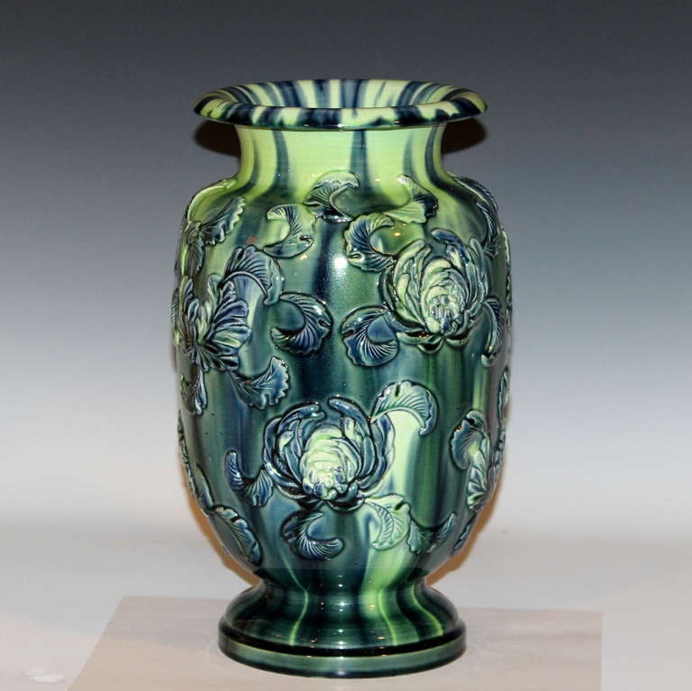 Large Kyoto pottery vase in lozenge form with wide foot and flaring mouth rim. Decorated with applied chrysanthemums and blue over lime green crackle glaze. 11