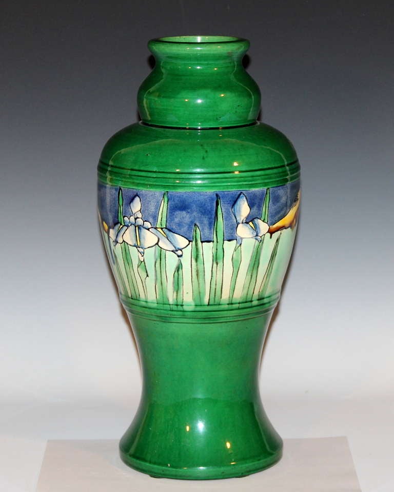 Large Awaji pottery vase in well proportioned double gourd form with painted band at the midsection depicting irises growing by the water with mountains in the background. Measures: 15