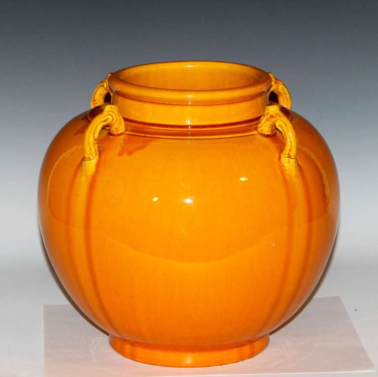 Large Awaji pottery vase with wide, collared mouth, twig lug handles, and golden yellow crackle glaze, circa 1930. 9 1/2