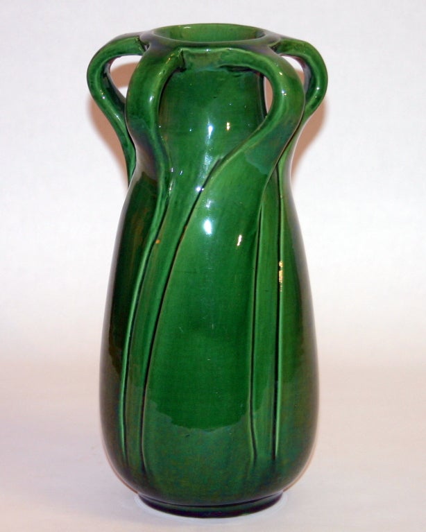 Japanese Awaji pottery studio vase in elegant organic form in vibrant translucent green glaze.
