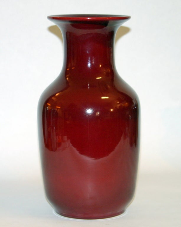 Large vintage hand made vase from the Alvino Bagni studio in Florence for the Raymor Distributing Co. in rich red oxblood glaze. With original label.