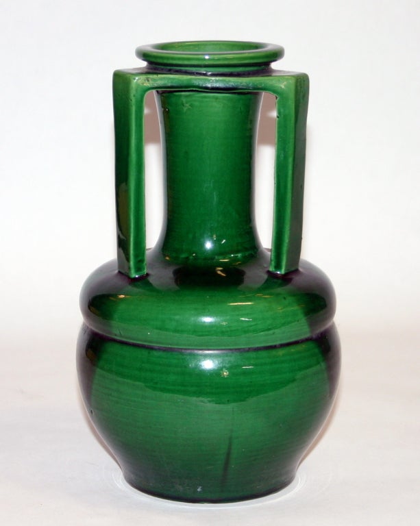 Transitional Japanese Awaji pottery vase with curvy art nouveau body wedded to angular art deco/prairie school handles.