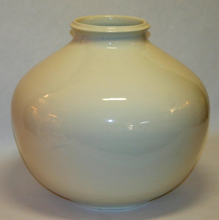 Huge vintage hand thrown studio vase in cream crackle glaze, circa 1970. Very beautiful in a simple, pared down, modernist way. Not sure of origin, Japanese, Italian, American? Remnant of a label on base.