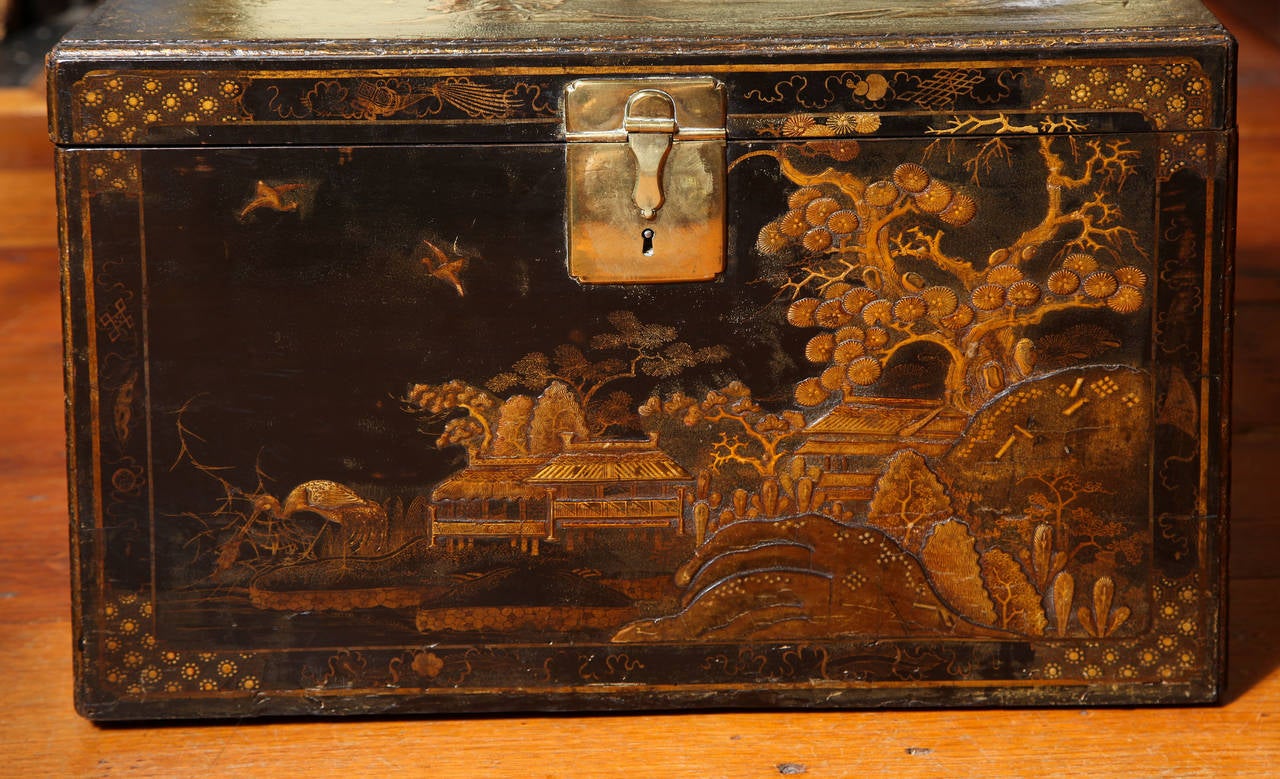 Very fine and rare Queen Anne period Japanned chinoiserie coffer, retaining the original decoration on all four sides and top and the origiinal gilt brass hardware. Decorated all-over with figures and birds in landscapes, with wild beasts to either