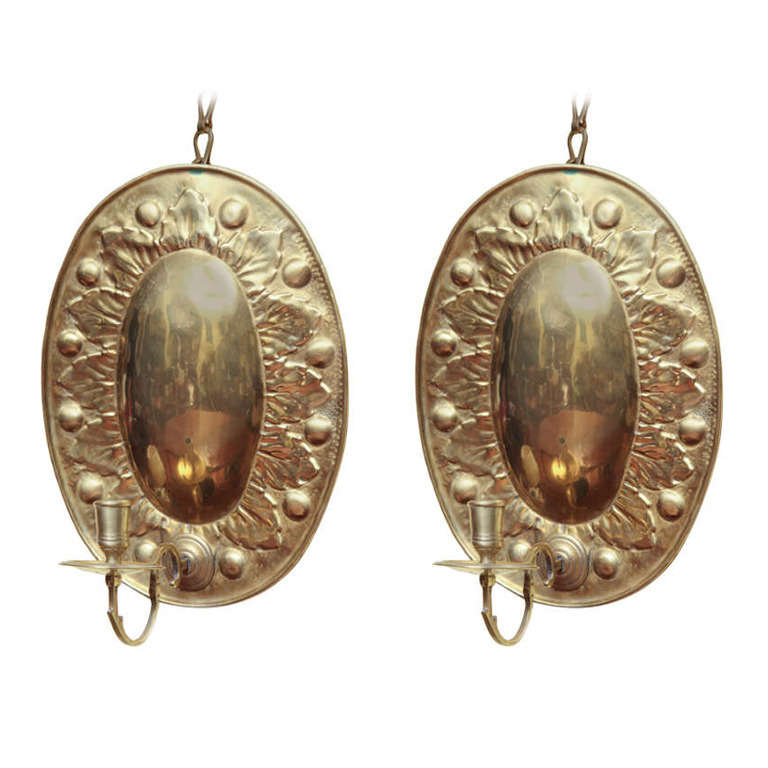 Very Fine and Rare Pair of Antique Oval Repousse Brass Sconces, circa 1700