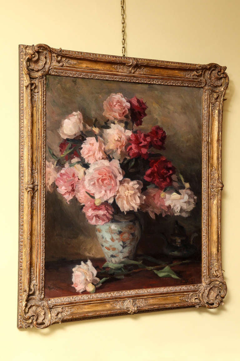 Still life with roses in a porcelain vase. Oil on canvas, by Einar Hugo Olsen, Danish (1876-1950), initialed monogram and date lower right E. 1933 O, in a richly carved giltwood frame.

Olsen was born in Copenhagen and studied at the Kunstakademiet