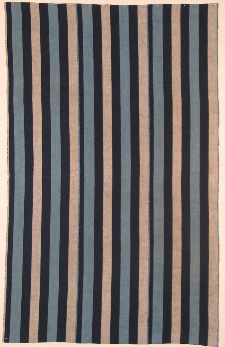 Early 20th century Japanese cotton striped futon cover with bold stripes in indigo blue, light blue and gray.  Three widths joined.